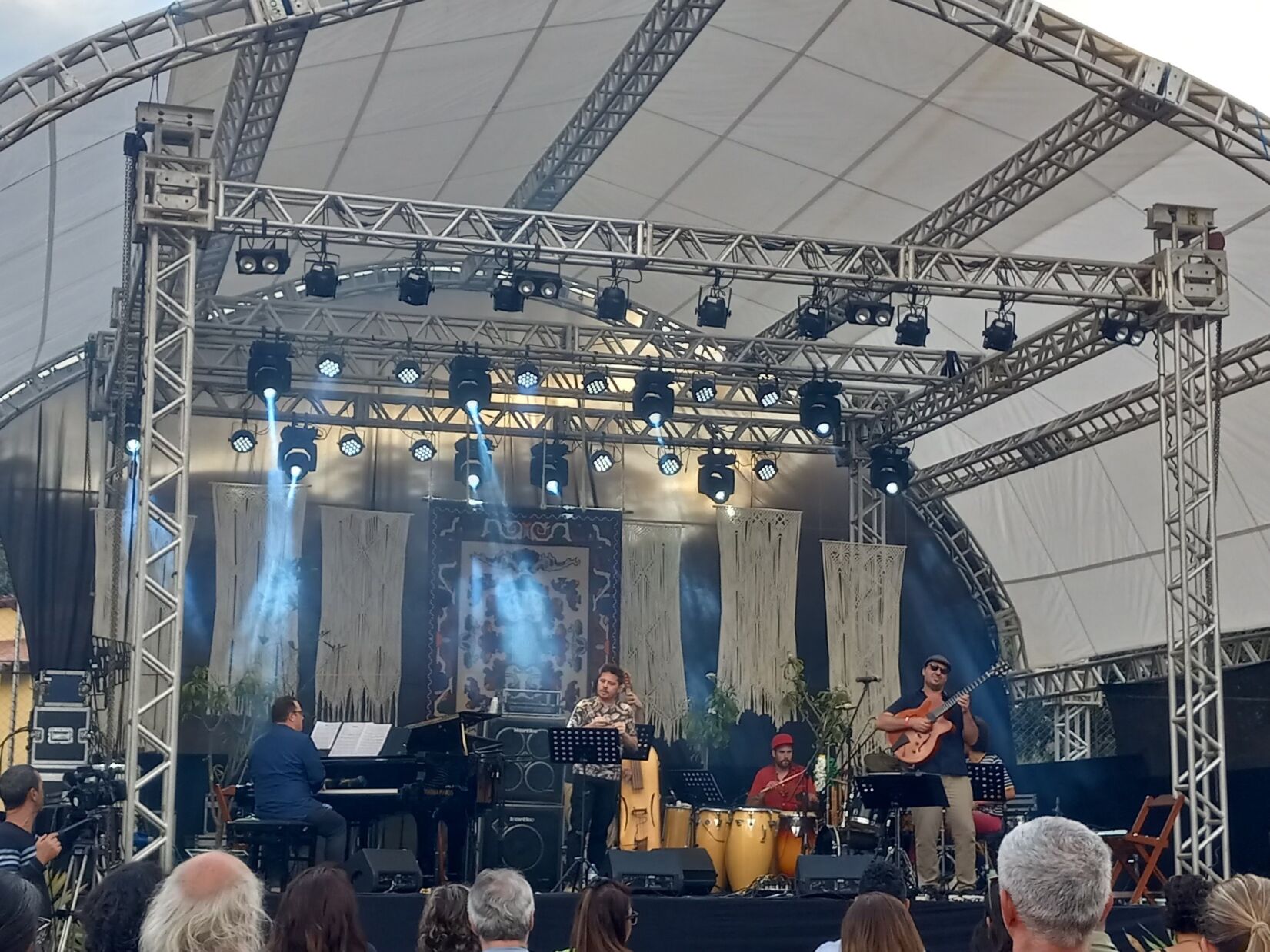 Concert stage with five jazz musicians